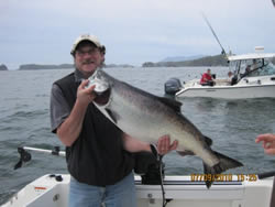 Danny of Trail B.C. was on his first ever salmon trip this past week.  Danny fished with his son Brad and with guide Doug of Slivers Charters Salmon Sport Fishing,  This 28 pound Chinook was landed at Pinnacle Rock located at the Barkley Sound surf line.