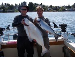 Ed and Graham with halibut and Chinook picked up on Mothers day.  Show these two fish at the Ucluelet Harbor located on the west coast of Vancouver Island.  Guide was Al of Ucluelet, B.C.