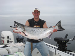 The fishing in the summer of 2010 is forecast to be rather spectacular.  We all thought 2009 was good…well look out 2010 is going to be better.  Brad from B.C. was on his honeymoon and fished Barkley Sound and Just a few miles offshore with Doug of Slivers Charters Salmon Sport fishing.  This Chinook was landed using a hootchie and 42 inches of leader behind a green hotspot flasher.