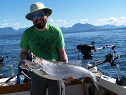 The weather on the west coast of British Columbia Vancouver Island has improved as has the fishing. Kevin from Vancouver fishing with guide Al Shows his 26 pound Chinook caught on Mothers Day Weekend. Fish was caught around Great Bear just outside the Ucluelet Harbor on a hootchie.