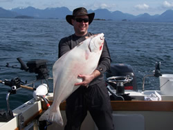 Ed from Edmonton with his 31 pound halibut picked up outside the Ucluelet Harbor in an area known as The Alley.