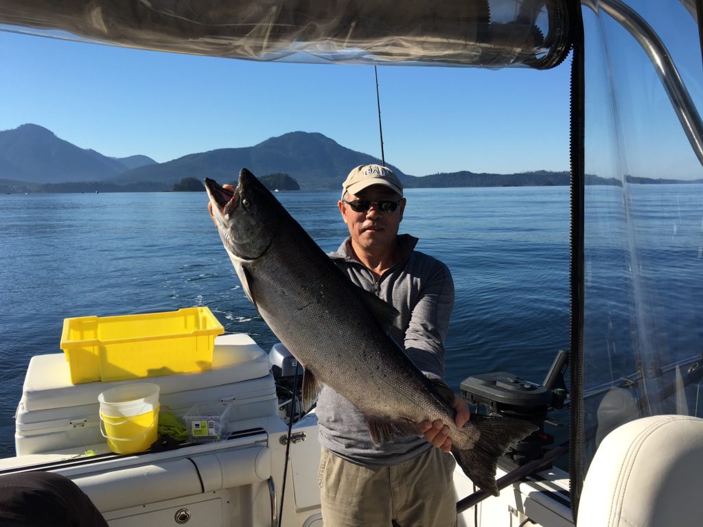 Jin from Toronto Ontario fished with Doug of Slivers Charters Salmon Sport Fishing and landed this twenty-three pound Chinook using anchovy in Barkley Sound