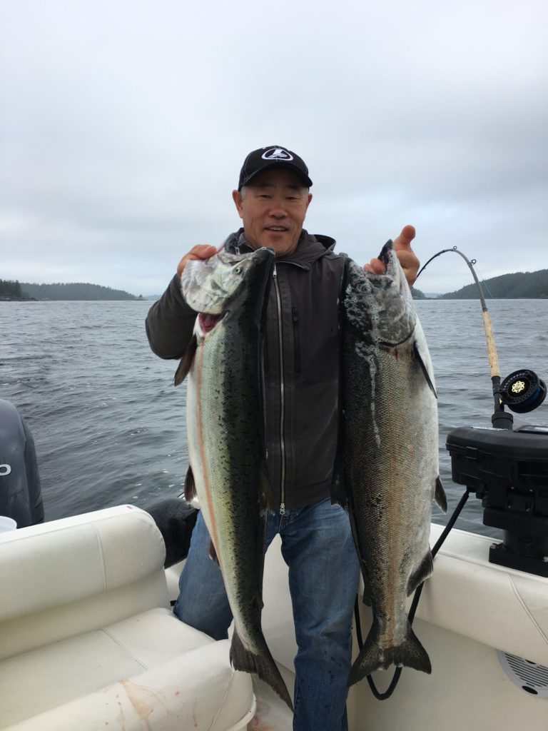  Jin from Toronto Ontario salmon fished with Doug and Slivers Charters Salmon Sport Fishing and landed these two salmon using anchovy